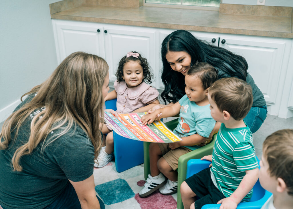 Pediatric therapist working with young children during a play-based therapy session at Allison’s Therapy Corner.